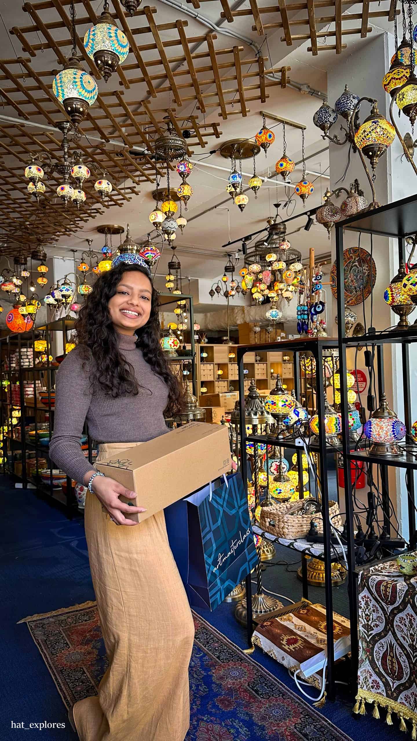 Valentine's Day gift ideas for travelers: Beautiful lamps, some hanging some on the shelf at the Mosaic lamp wprkshop!