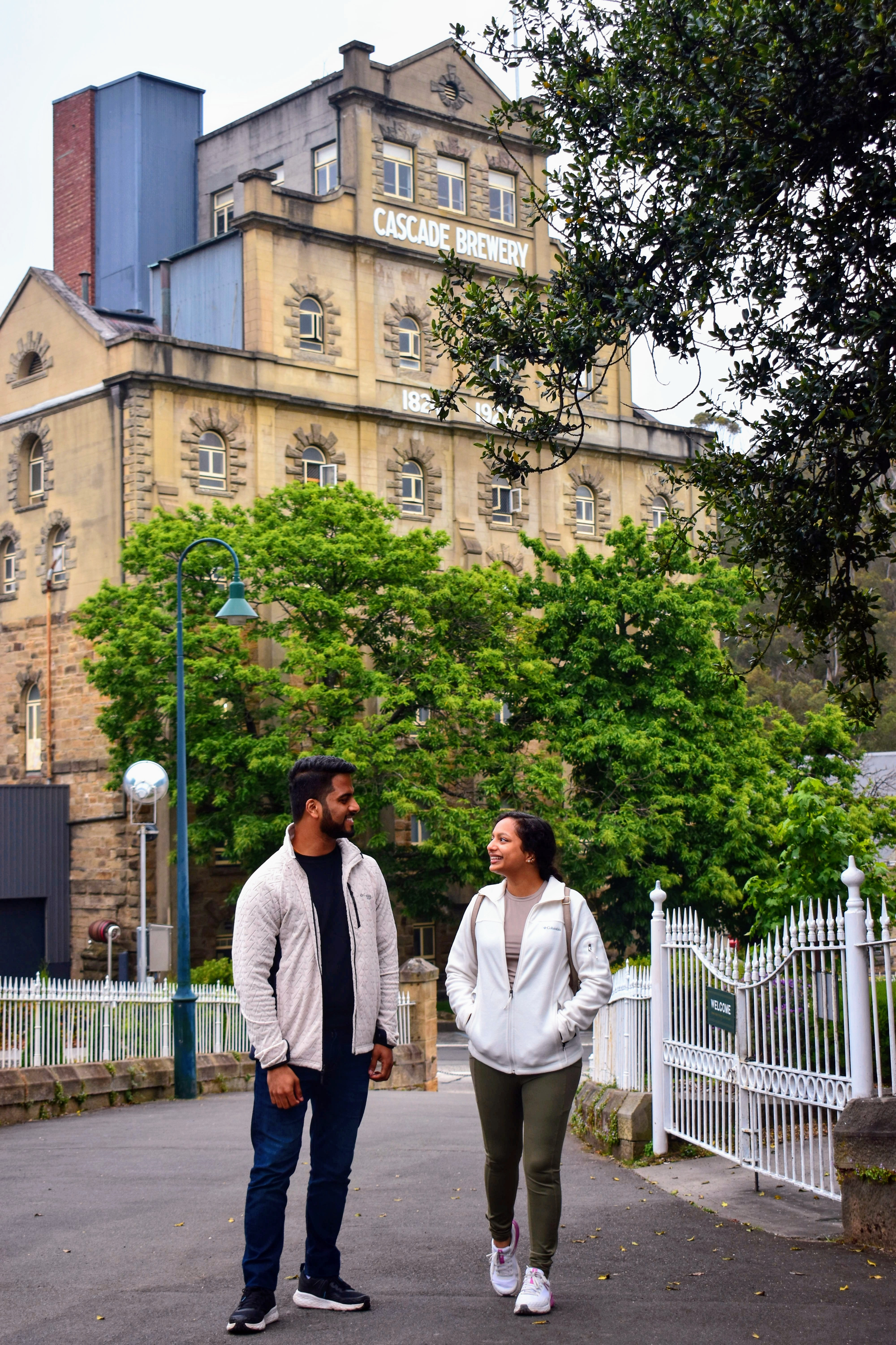 Couple walking out of Cascade Brewery