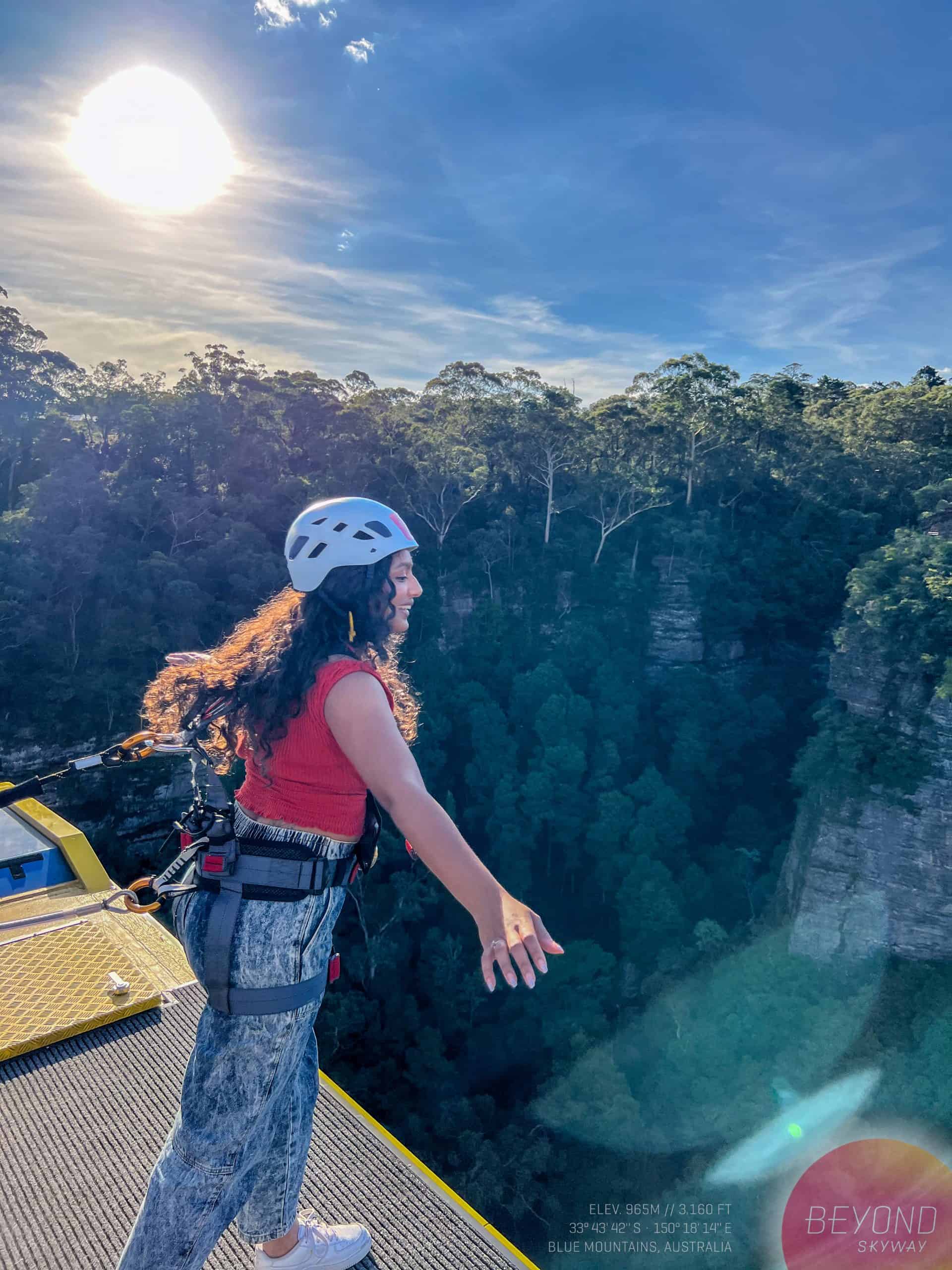 Leaning with the harness to experience Beyond Skyway Scenic World