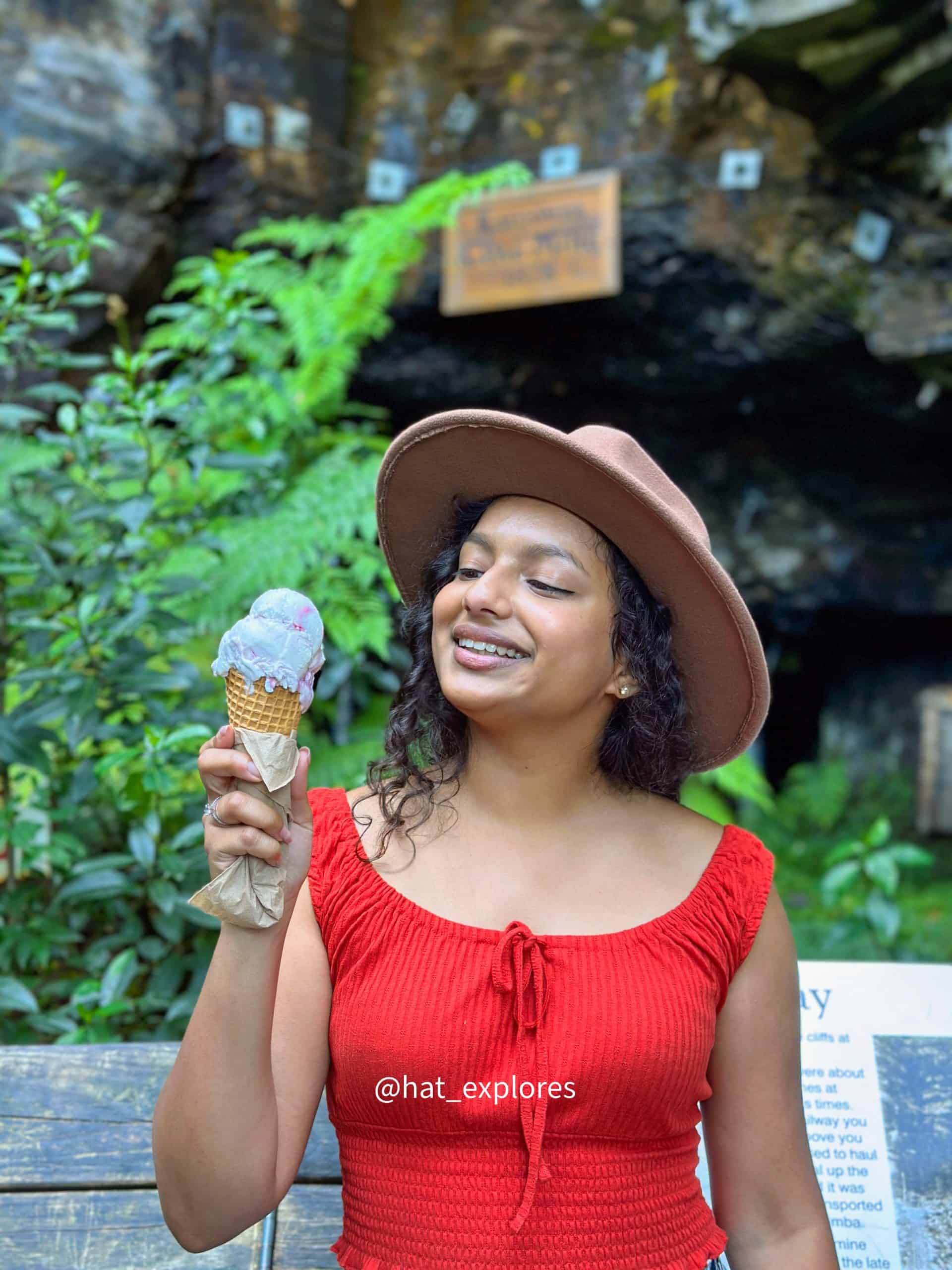 Enjoying the Boysenberry ice cream outside the the coal mining cave at Scenic Walkway