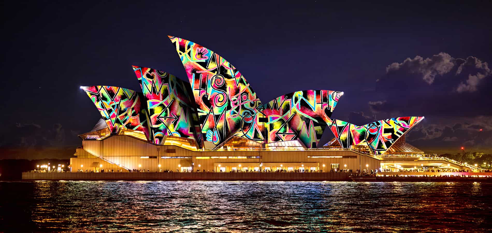 The iconic Sydney Opera House illuminated with stunning projections for Vivid Sydney 2025, transforming its sails into a luminous masterpiece